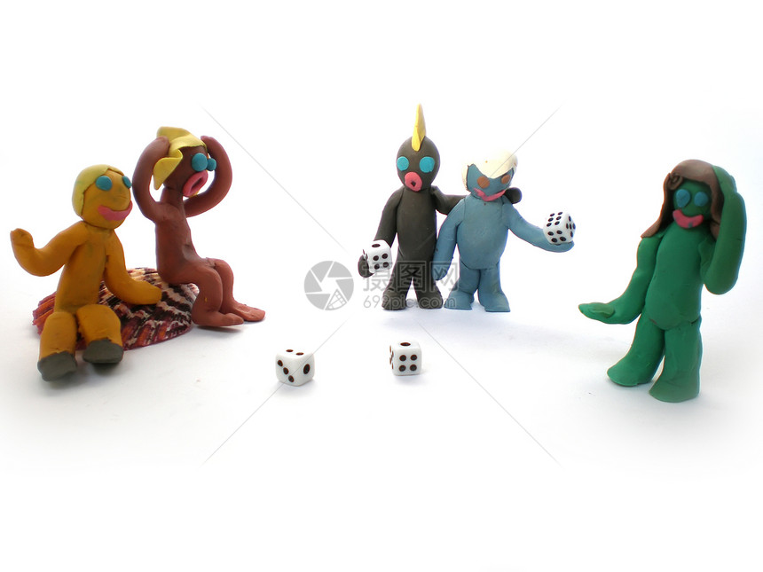 玩骰子的可塑塑料人滚动运气风险快乐黏土娱乐玩家手工塑像喜悦图片