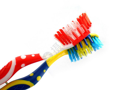 白色背景上孤立的牙刷红色牙科口服蓝色刷子擦洗凝胶卫生牙医牙齿背景图片