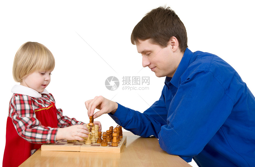 人与儿童下象棋娘娘腔学习木板衬衫蓝色伴侣白色典当男人棋子图片