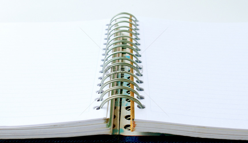 笔记本电脑戒指营销教育学习文档螺旋日记办公室白色教科书图片