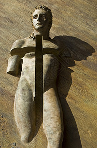 教堂门上的雕塑金属艺术男人旅行建筑建筑学雕像背景图片