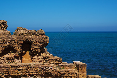 阿尔及利亚提帕萨海边的废墟背景