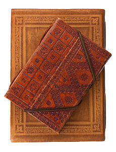 两本红棕色和红皮的日记书背景图片
