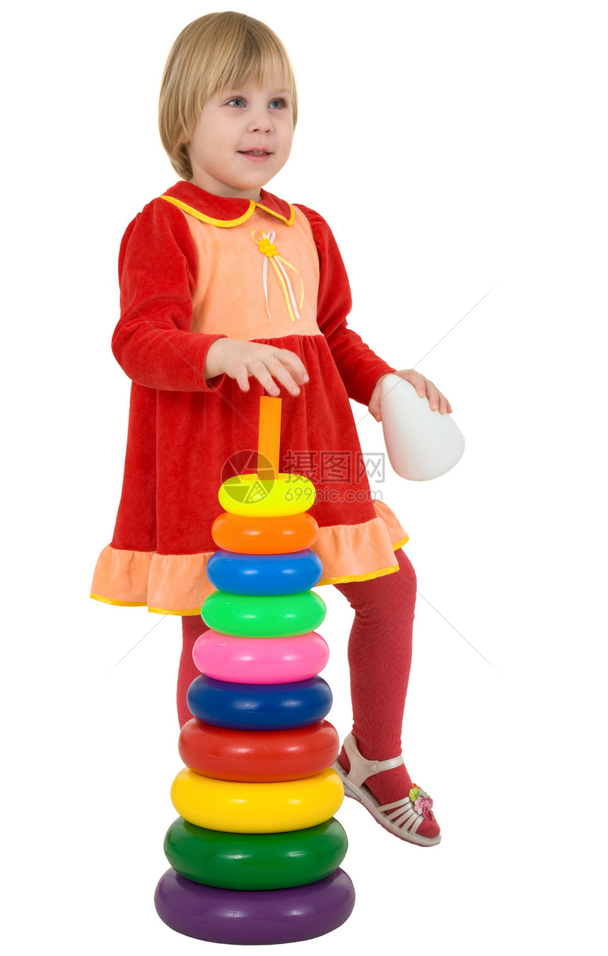 小女孩和玩具金字塔绿色女士黄色孩子女孩紫色乐趣童年金发喜悦图片