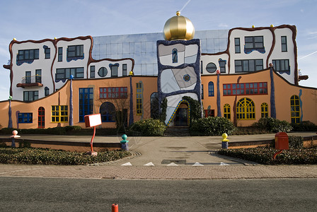 办公大楼历史历史性纪念碑砖块建筑学马赛克窗户太阳建筑植被背景图片