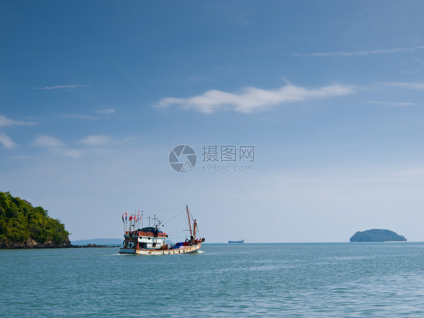 渔船天空自由海洋发动机帆船热带天堂运输汽艇航行图片