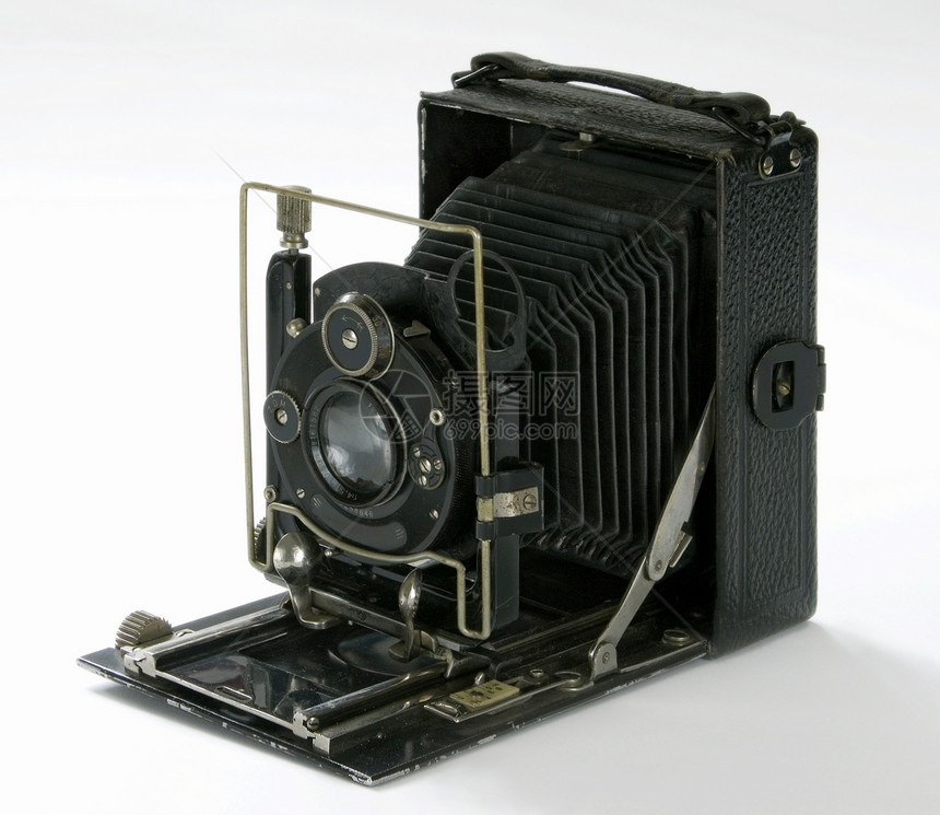 旧折叠相机精神快门金属机械白色镜片摄影技术照片工匠图片