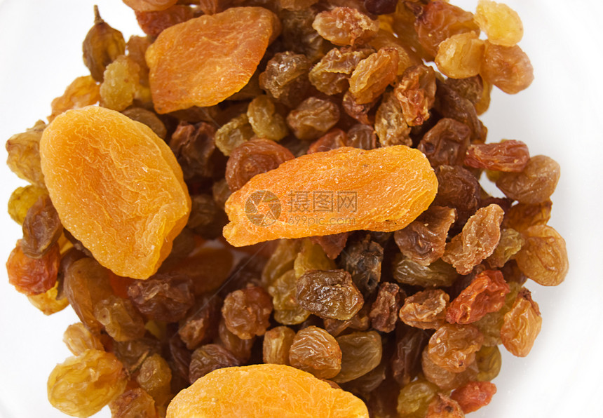 干燥的杏仁和葡萄干水果宏观饮食美食棕色矿物早餐食物营养图片
