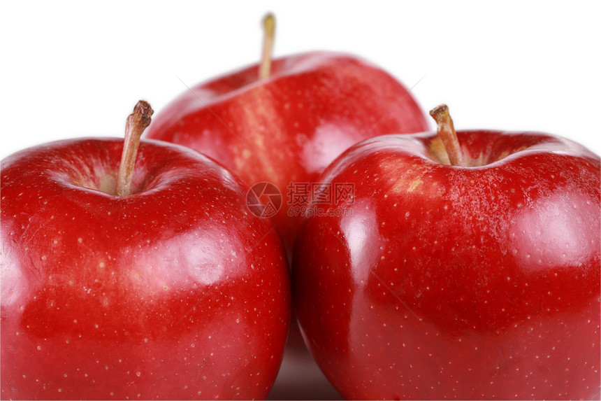 三个闪亮的红苹果红色营养宏观小吃水果图片