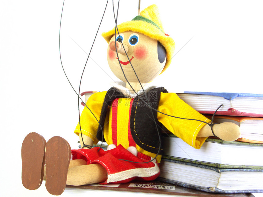 木偶和书娃娃概念学校教育黑色玩具木头红色黄色图片