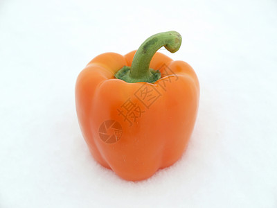 雪上胡椒蔬菜胡椒橙子辣椒白色背景图片