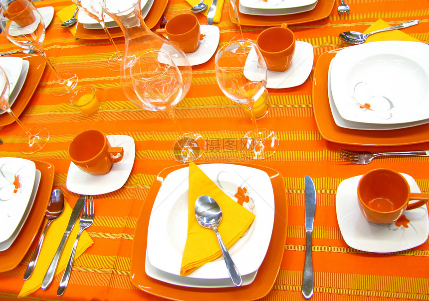 橙色表格派对盘子厨房勺子餐巾庆典橙子餐厅餐具食物图片
