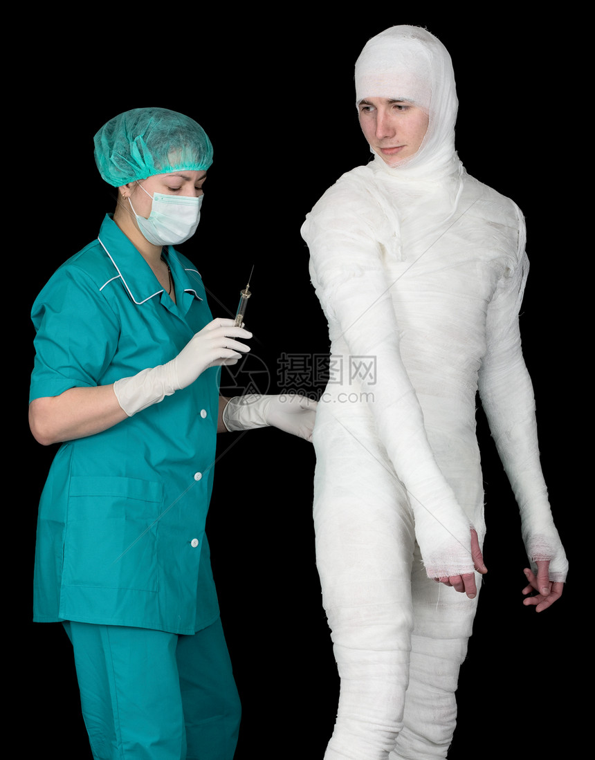 医生和病人护士白色黑色面具木乃伊手套绷带绿色药品医学图片