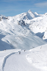 小兔子滑雪摄影冬天顶峰摄影天空蓝色滑雪背景