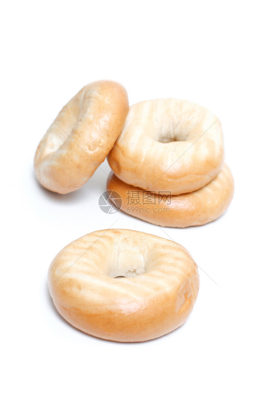 百吉饼圆形摄影饮食面包早餐食物圆圈反射白色棕色图片