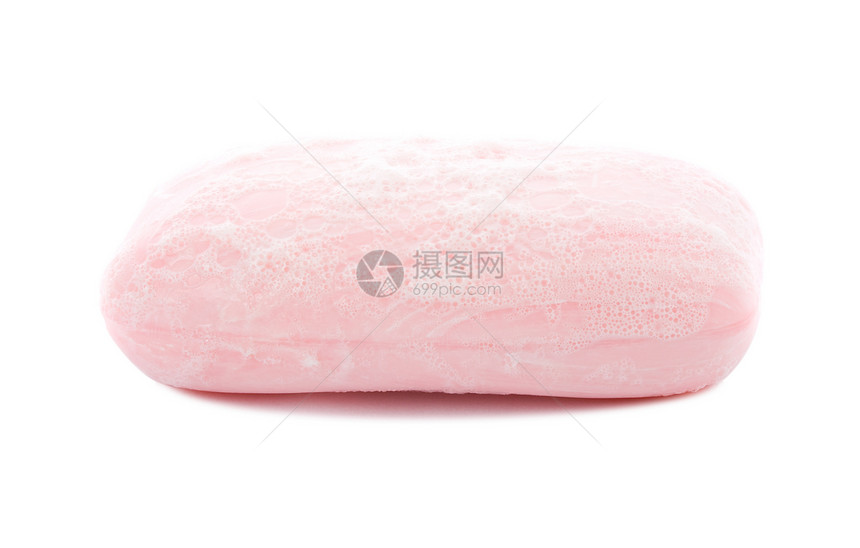 含有泡沫的粉色马桶肥皂图片