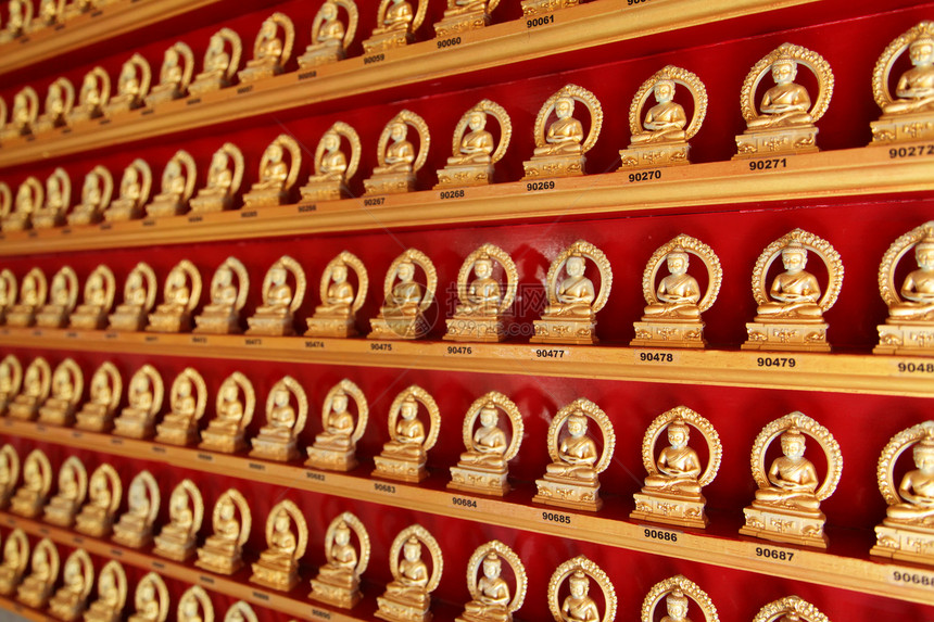 在中国寺庙的佛佛供品崇拜雕像信仰旅游奉献游客景点宗教吸引力图片