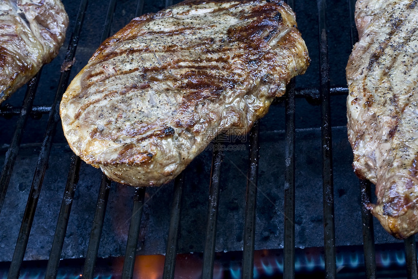 烹饪肉饭条纹炙烤丙烷烧烤金属厨房火焰食物营养气体图片