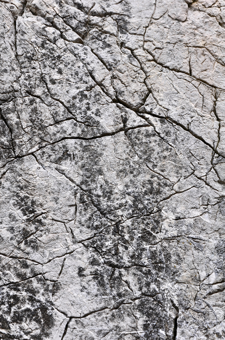 灰石和裂缝的紧闭纹理花岗岩岩石宏观摄影大理石石墙地面砂岩石头建筑图片