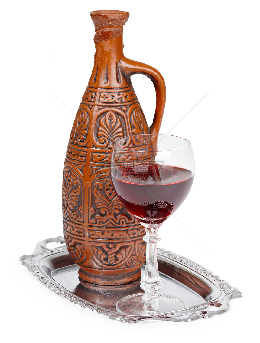 古老的带有格鲁吉亚葡萄酒的陶瓷瓶图片