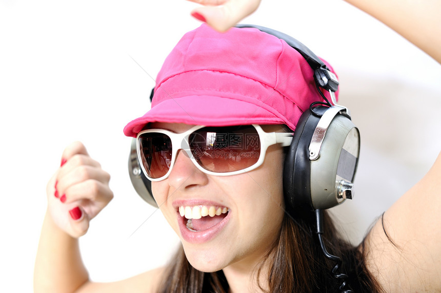 听音乐的音乐女孩耳机娱乐青少年唱歌美丽喜悦女士学习音乐播放器图片