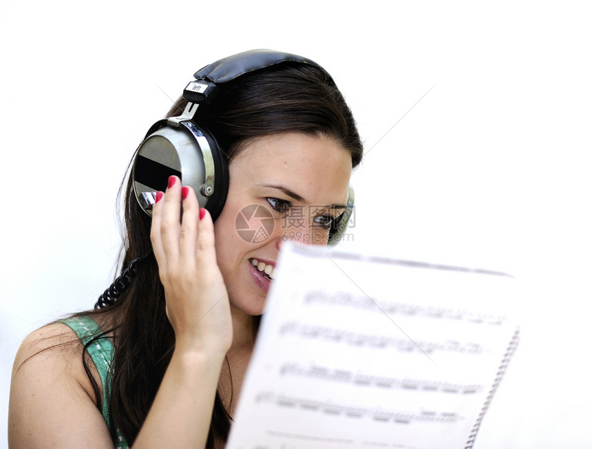 听音乐的音乐喜悦女孩音乐播放器娱乐青少年学习享受耳机美丽唱歌图片