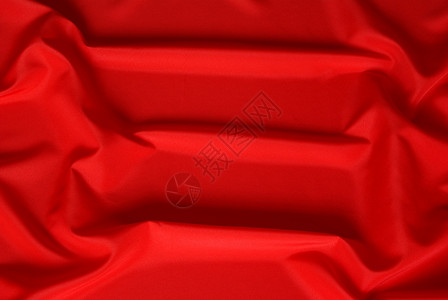 红色背景丝绸纺织品柔软度材料背景图片