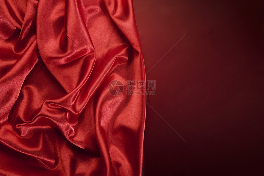 红色丝绸背景涟漪织物折叠奢华曲线纺织品亚麻床单热情布料图片
