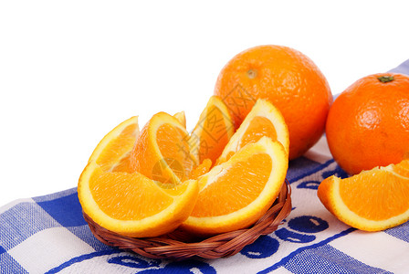 橙色螺旋食物蓝色粒子橙子包围背景图片