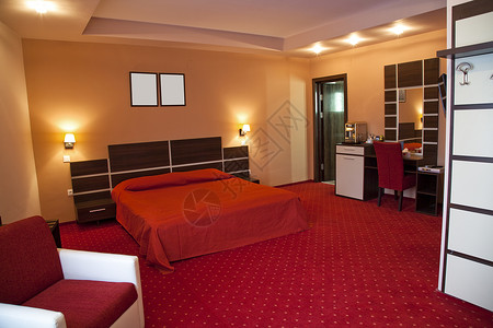 旅馆房间家具红色酒店客栈背景图片