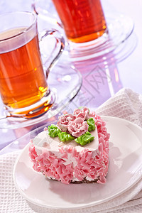 粉色杯子蛋糕花边蛋糕粉色玫瑰奶油杯子甜点食物糕点背景