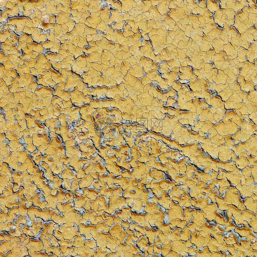 有裂缝的黄色长黄色墙壁图片