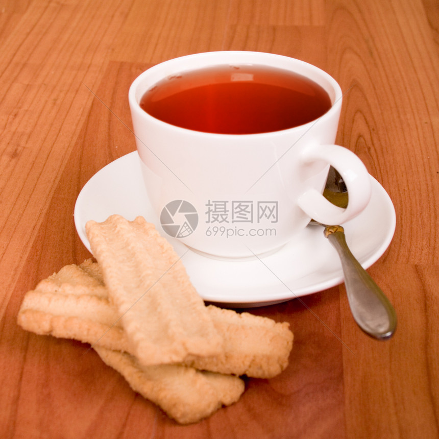 茶杯和饼干甜点餐厅飞碟芳香蛋糕补品奢华陶瓷小吃饮料图片