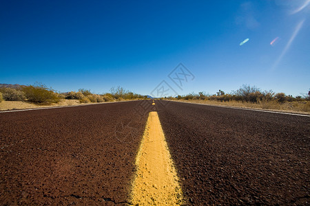 长路黄色自由分割线旅行勘探沙漠街道车道孤独背景