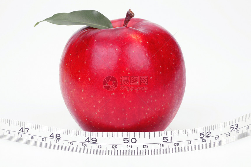 红苹果和测量磁带图片