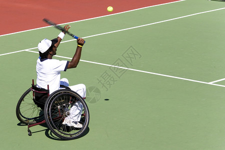残疾人轮椅网球主席男性男人挑战狂欢节障碍竞赛竞争者锦标赛运动优胜者车轮背景图片
