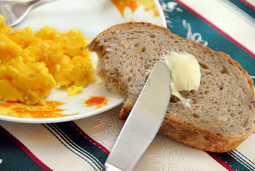 早餐家庭桌子厨房桌布营养午餐黄油盘子小吃食物图片