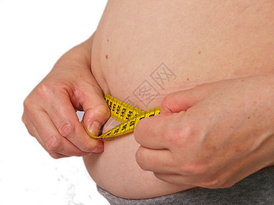 又胖了体重超重的女性 测量了湿宽度 白背景组织保健肥胖身体白色腰部数字皮肤重量卫生背景