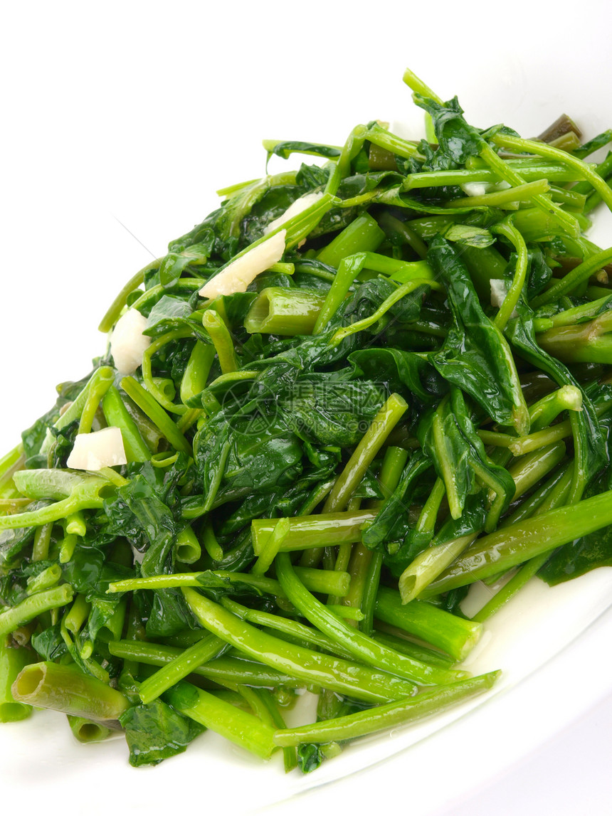 Friedach菠菜卷心菜 特写白色背景绿色食物菠菜蔬菜叶子图片