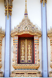 吉兰丹泰国佛教寺庙窗建筑寺庙上帝信仰佛陀神社反射佛教徒窗户宗教背景