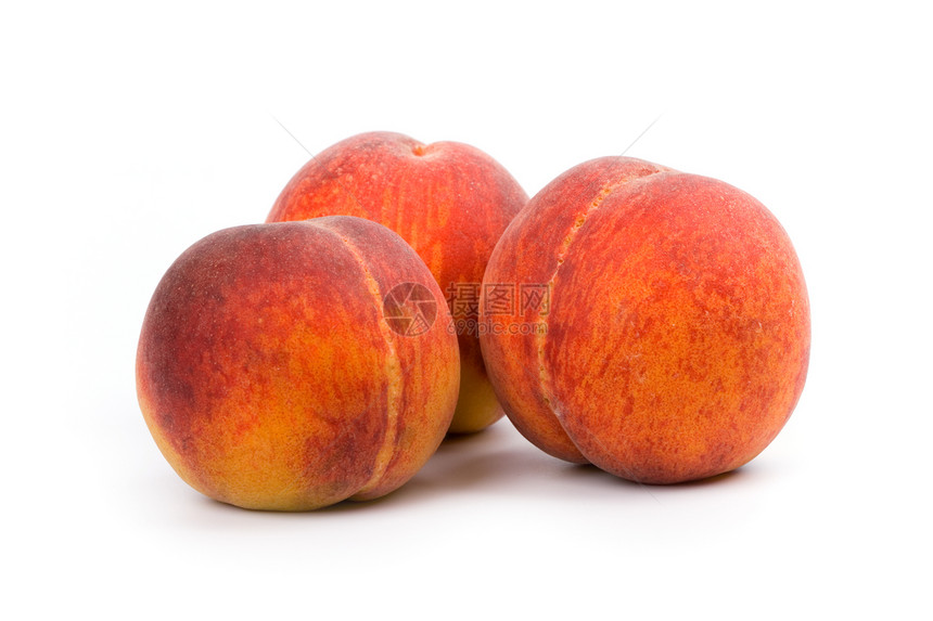 三个桃子水果宏观蔬菜季节食物圆形橙子白色红色画报图片