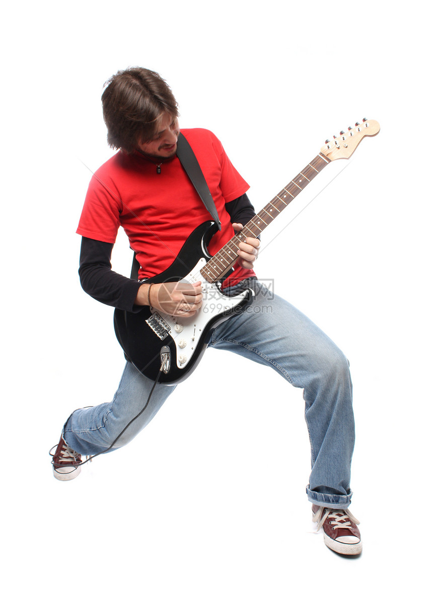 摇滚和滚动播放器吉他男性活力娱乐演员黑色乐器牛仔裤艺术家红色图片