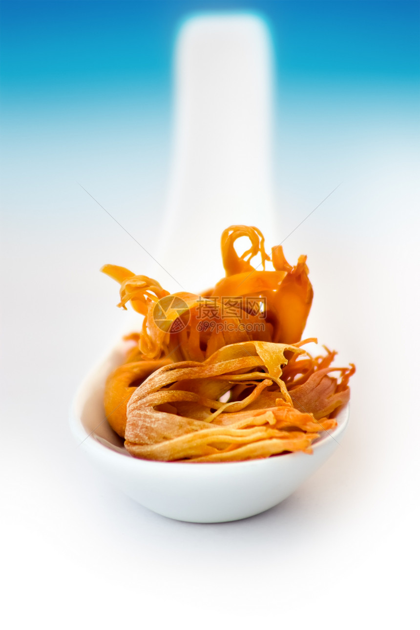 白勺子中的梅斯热带香料味道草本植物橙子烹饪药品芳香种子美食图片