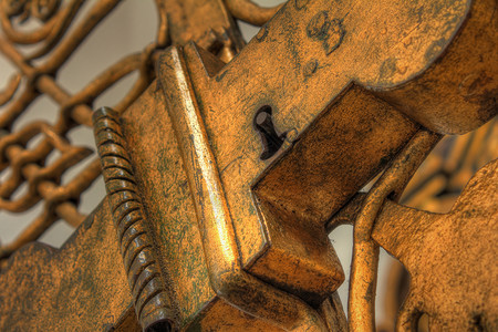 铜锁金子挂锁入口合金安全黄铜城堡金属古董圆圈背景图片