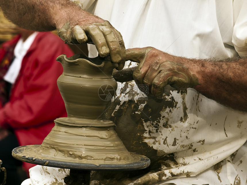 波特在工作时精神制品文化陶器技术黏土奉献遗产陶瓷传统图片