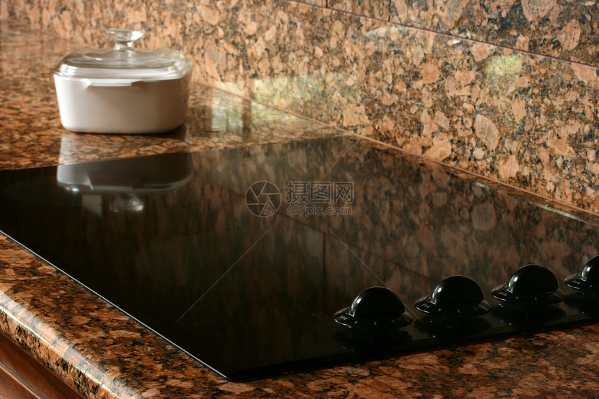 厨房炉灶白色玻璃加热器桌子火炉棕色柜台黑色花岗岩调节器图片