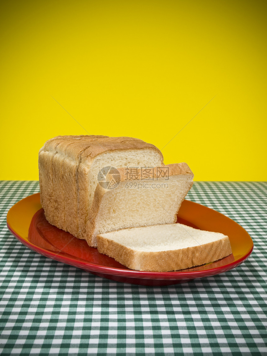 切片面包网格饮食桌布食物碳水化合物盘子脆皮奶制品早餐图片