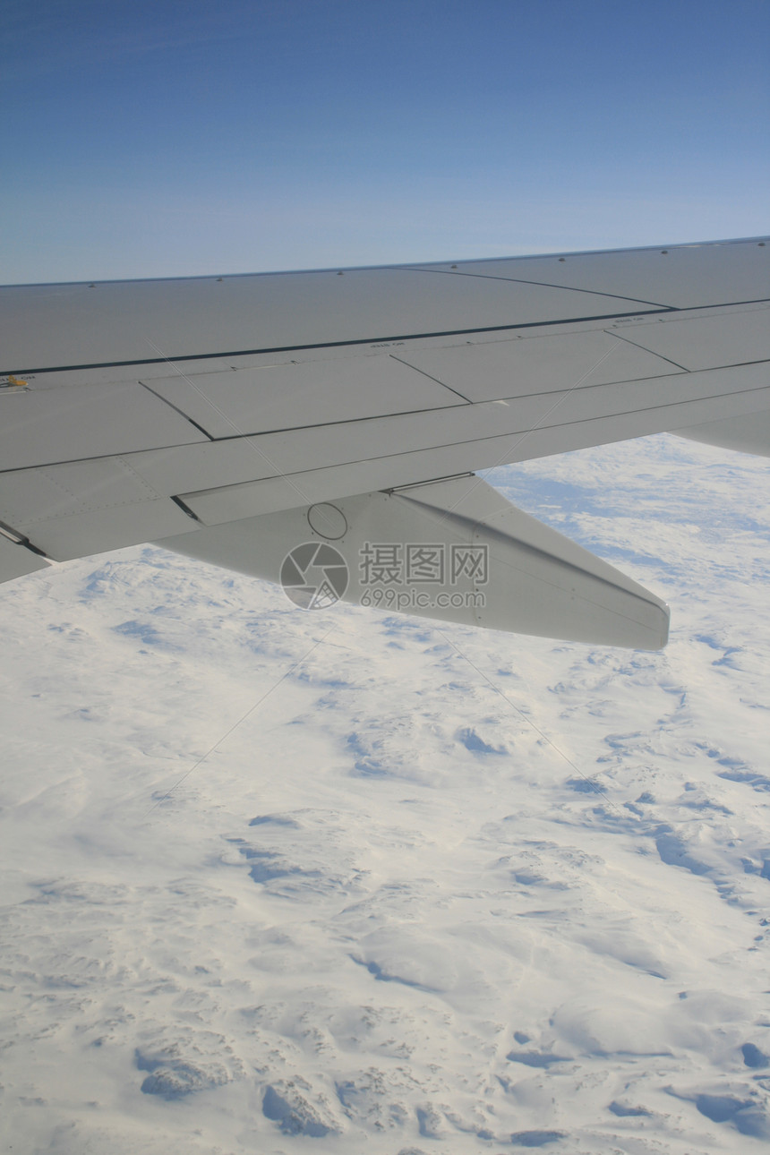 机翼荒地航班旅行苔原漂移天空喷射航空荒野地平线图片