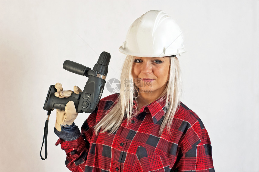 女建筑工妇女承包商建筑维修工人工具女士钻孔机器商业头盔图片