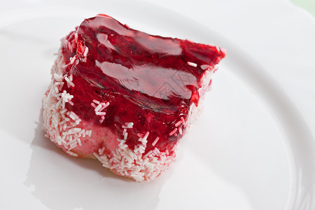 花边蛋糕甜点糕点宏观红色覆盆子食物背景图片
